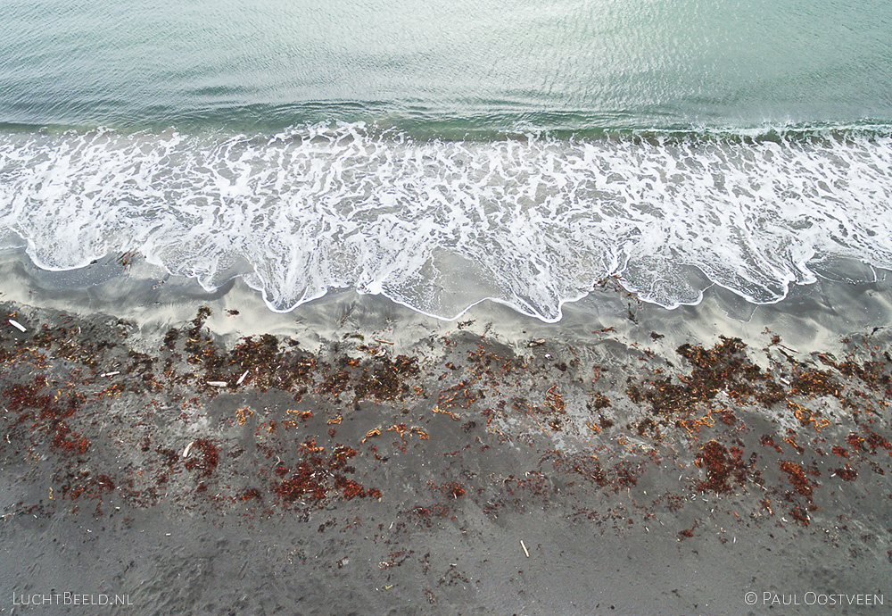 Beach at the coastline in Melrakkaslétta. Aerial photo captured with a camera drone.