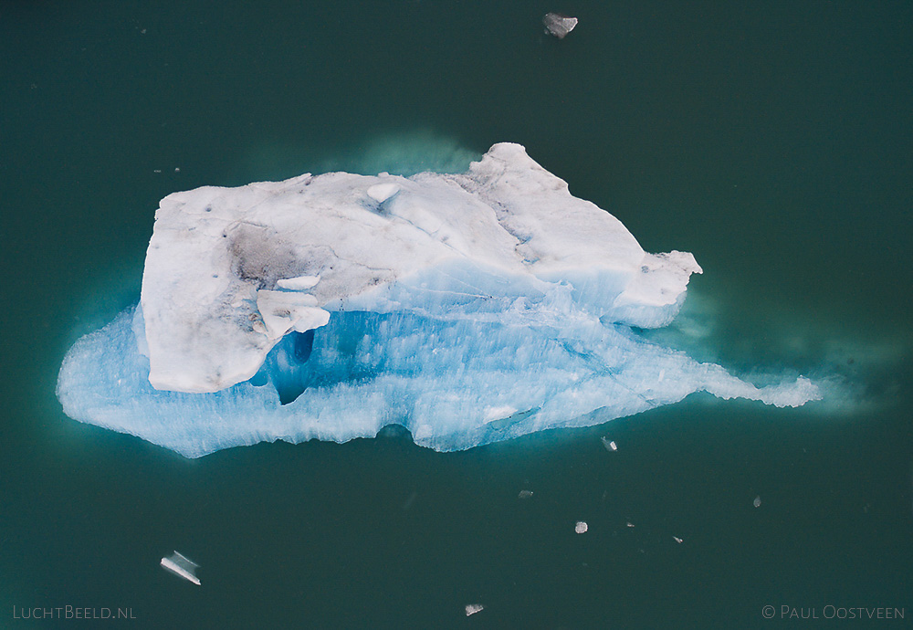 Floating iceberg in Jökulsárlón glacier lagoon in Iceland. Aerial photo captured with a camera drone (Phantom) by Paul Oostveen.