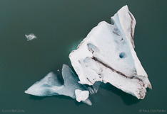Floating iceberg in Jökulsárlón glacier lagoon in Iceland. Aerial photo captured with a camera drone (Phantom) by Paul Oostveen.