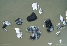 Floating icebergs in front of the glacier tongue Skaftafellsjökull in Iceland. Aerial photo captured with a camera drone (Phantom) by Paul Oostveen.
