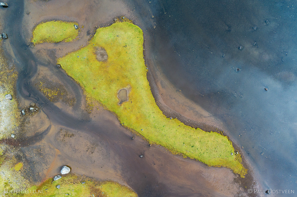 Island in a lake in the Westfjords of Iceland. Aerial photo captured with a camera drone by Paul Oostveen.