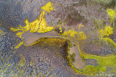 Small lake on Kollabudaheidi in the Westfjords of Iceland. Aerial photo captured by drone.