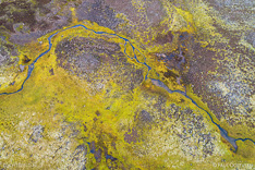 Small stream on Steingrimsfjardarheid in the Westfjords of Iceland. Aerial photo captured by drone.