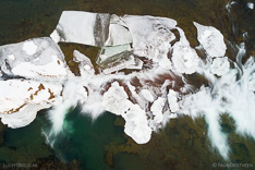 Tröllafossar waterfalls in Iceland in the winter. Long exposure aerial photo captured with a camera drone (Phantom) with aid of a ND16 filter. Tröllafossar means waterfalls of the trolls. Photographer: Paul Oostveen.