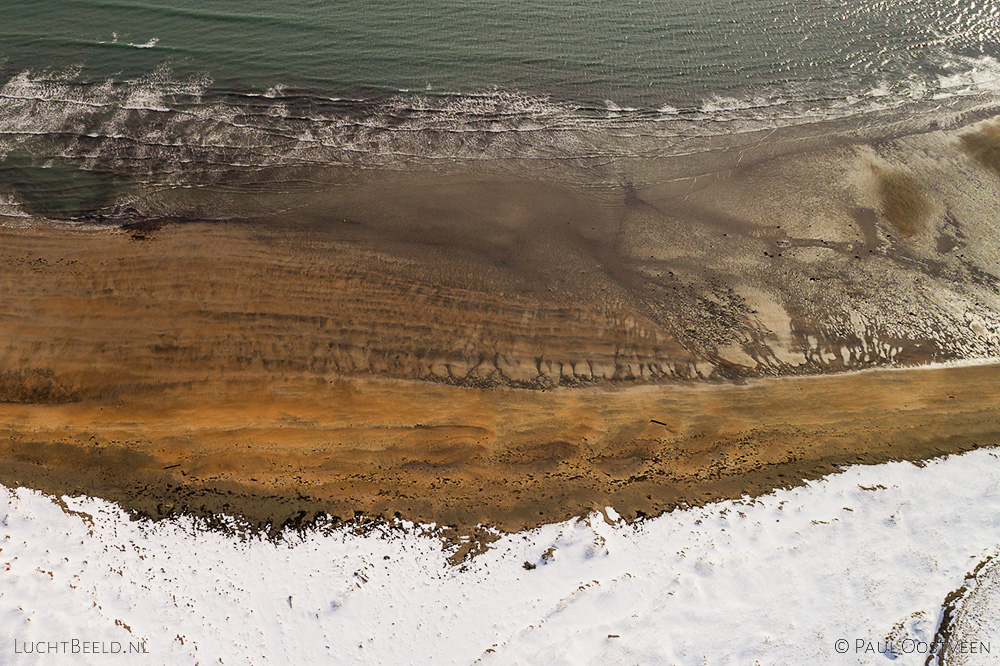 Beach at Búðir on Snæfellsnes in winter with snow. Aerial photo captured with a camera drone (Phantom) by Paul Oostveen.