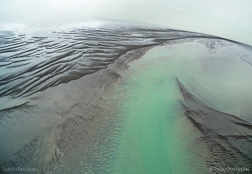 Shallow in the fjord Borgarfjörður in western Iceland. Aerial photo captured with a camera drone (Phantom) by Paul Oostveen.