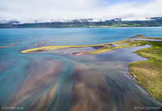 River flows into fjord Eyjafjörður in northern Iceland. Aerial photo captured with a camera drone (Phantom).