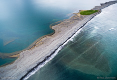 Barrier island between the sea and lagoon in northern Iceland. Aerial photo captured with a camera drone (Phantom).