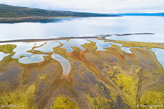 Coast in Isafjordur fjord in the Westfjords of Iceland. Aerial photo captured by drone.
