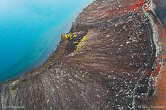 Edge of the Bláhylur crater lake in Fjallabak in Iceland. Aerial photo captured by drone.
