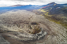 Lava field with fissure from the 1970 eruption of Hekla volcano in Iceland. Aerial photo captured by drone.