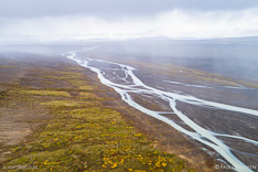 Rainshowers over Jokulfall (Jokulvisl) river in Kjölur in the highlands of Iceland. Aerial photo captured by drone.