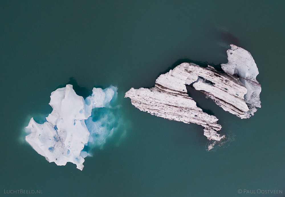 Floating icebergs in Jökulsárlón glacier lagoon in Iceland. Aerial photo captured with a camera drone (Phantom) by Paul Oostveen.
