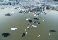 Floating icebergs in front of the glacier tongue Skaftafellsjökull in Iceland. Aerial photo captured with a camera drone (Phantom) by Paul Oostveen.