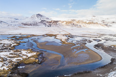 Estuary at Búðir on Snæfellsnes in winter with snow. Aerial photo captured with a camera drone (Phantom) by Paul Oostveen.