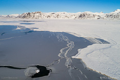 Frozen lake in Snæfellsnes in winter. Aerial photo captured with a camera drone (Phantom) by Paul Oostveen.